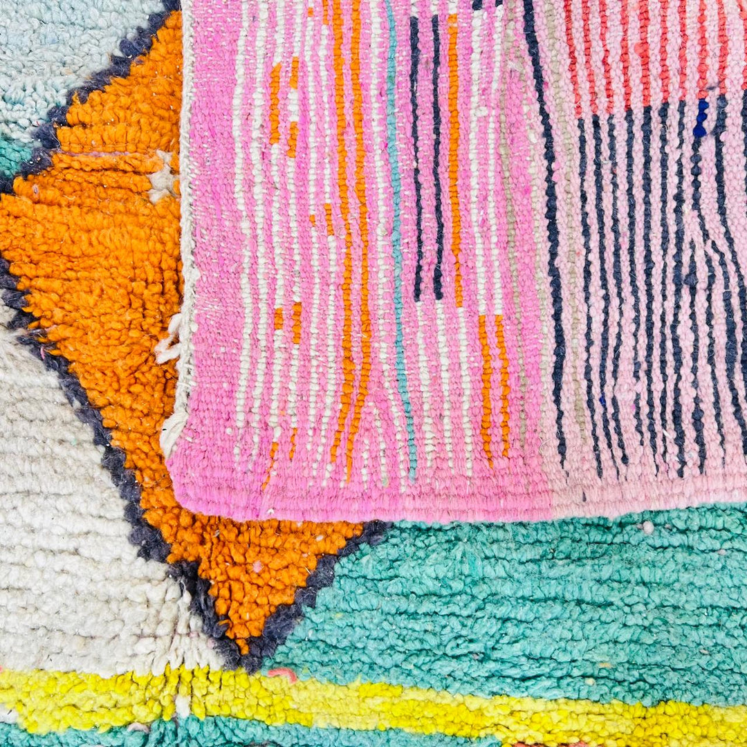 Colorful vintage Moroccan Berber rug with geometric patterns handwoven in wool