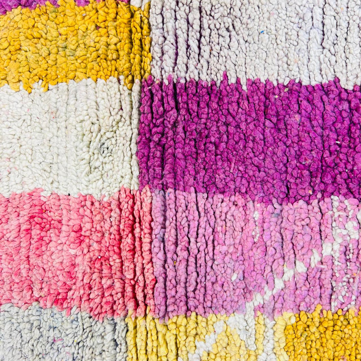 Vintage Moroccan wool rug with colorful geometric Berber design, handmade in Morocco