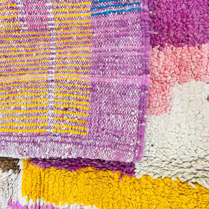 Vintage Moroccan wool rug with colorful geometric Berber design, handmade in Morocco