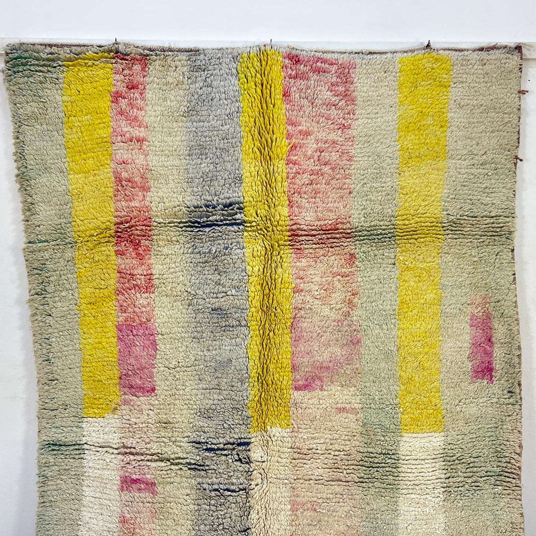 Vintage Moroccan wool rug 789 – handwoven pastel Berber carpet with yellow, pink, cream, and blue tones (241 × 160 cm / 7.9 × 5.25 ft).