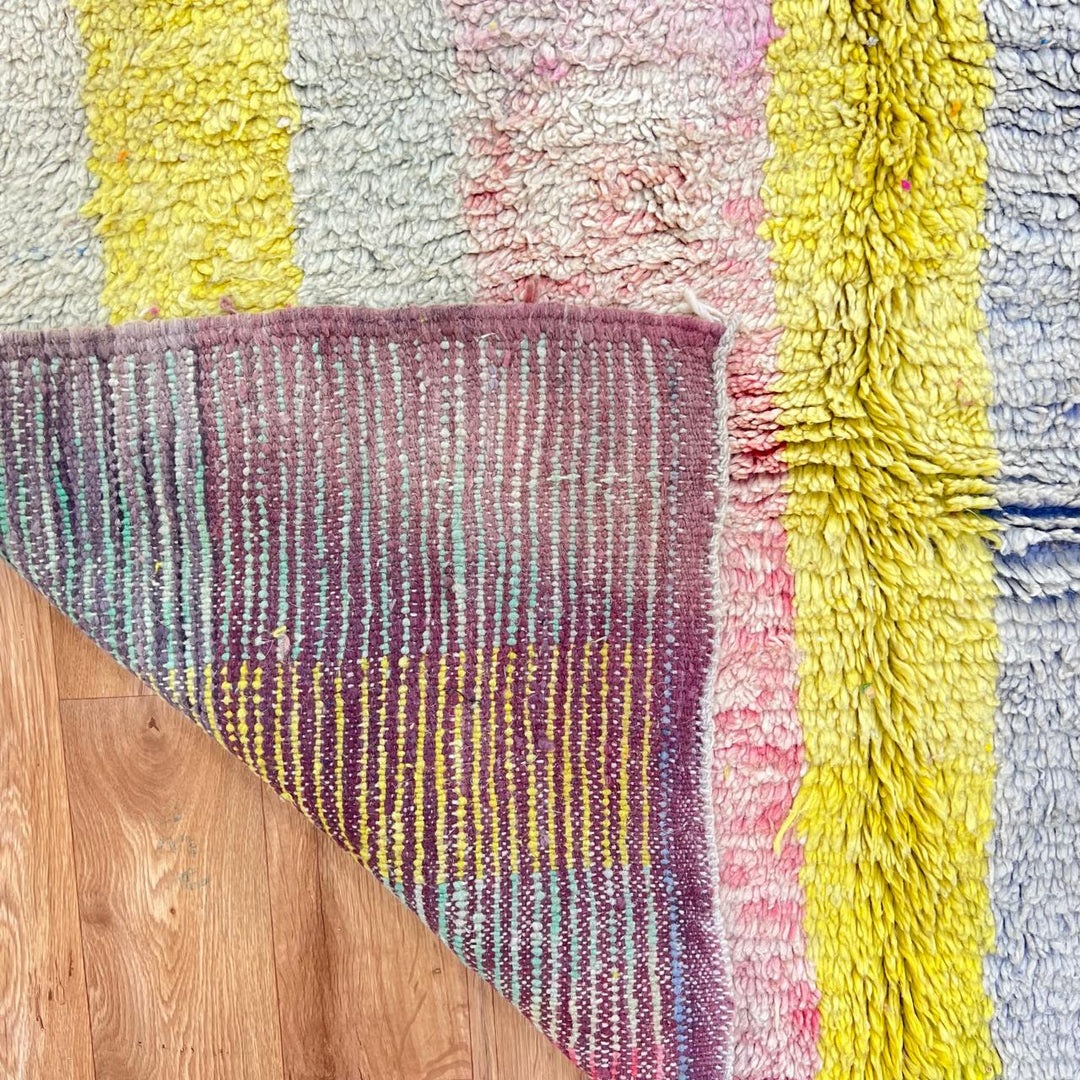 Vintage Moroccan wool rug 789 – handwoven pastel Berber carpet with yellow, pink, cream, and blue tones (241 × 160 cm / 7.9 × 5.25 ft).