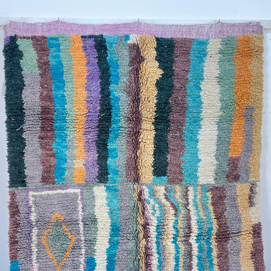 Vintage Moroccan wool rug 770 – handwoven Berber carpet with colorful vertical stripes in turquoise, yellow, gray, and cream (253 × 153 cm / 8.3 × 5.02 ft).
