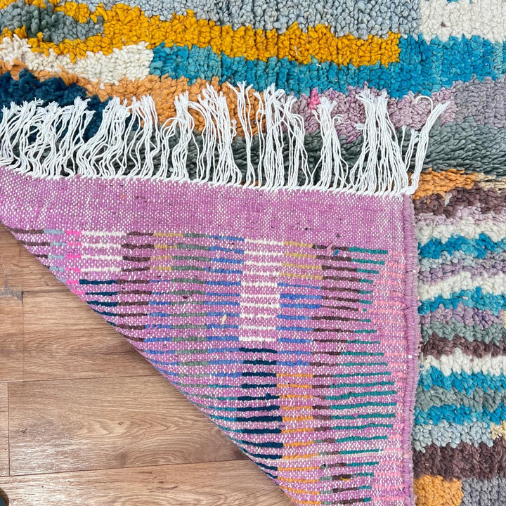 Vintage Moroccan wool rug 770 – handwoven Berber carpet with colorful vertical stripes in turquoise, yellow, gray, and cream (253 × 153 cm / 8.3 × 5.02 ft).