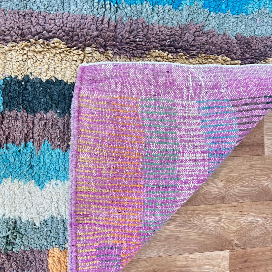 Vintage Moroccan wool rug 770 – handwoven Berber carpet with colorful vertical stripes in turquoise, yellow, gray, and cream (253 × 153 cm / 8.3 × 5.02 ft).