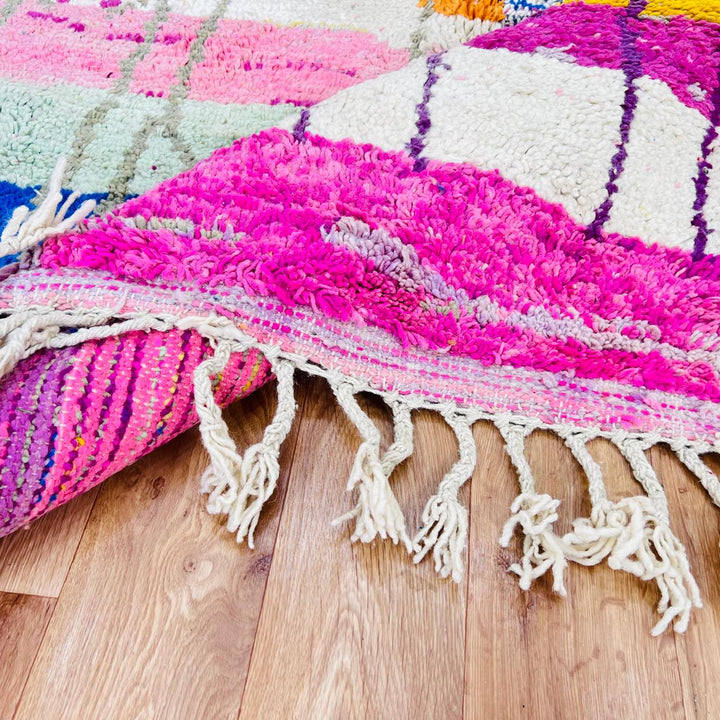Vintage Moroccan Berber wool rug with colorful geometric patchwork pattern
