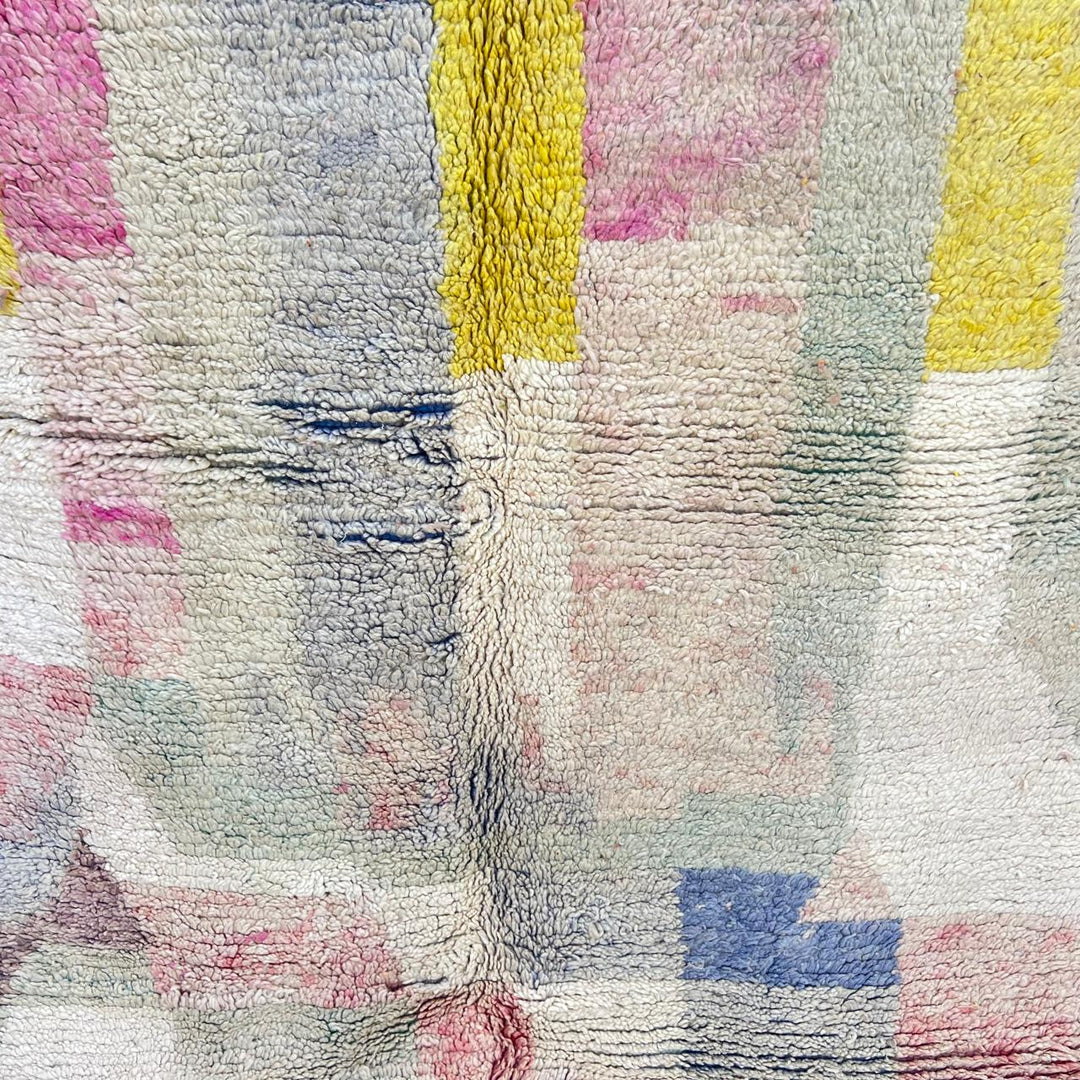 Vintage Moroccan wool rug 789 – handwoven pastel Berber carpet with yellow, pink, cream, and blue tones (241 × 160 cm / 7.9 × 5.25 ft).