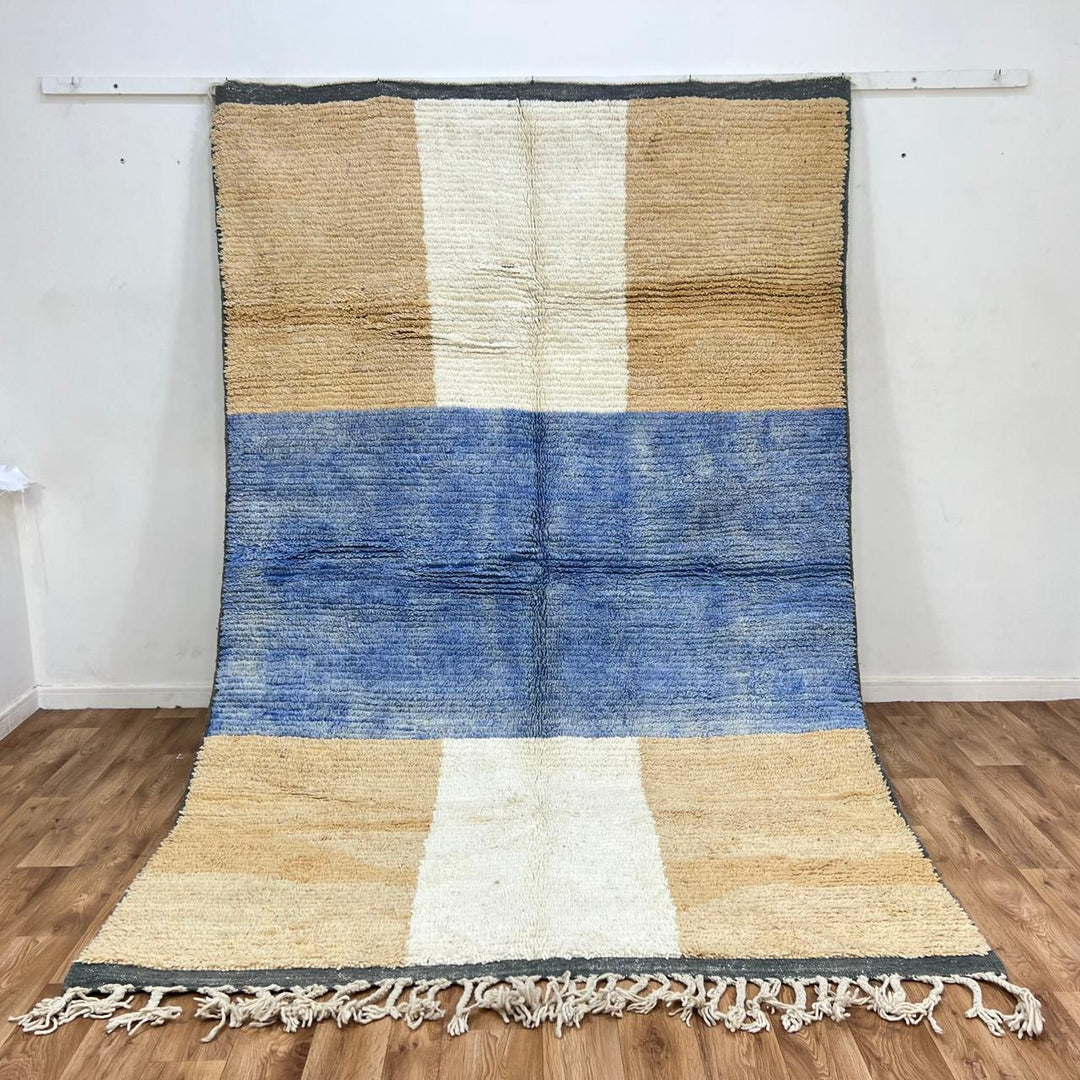 Vintage Moroccan wool rug with blue and beige color-block minimalist Berber design, handwoven in Morocco