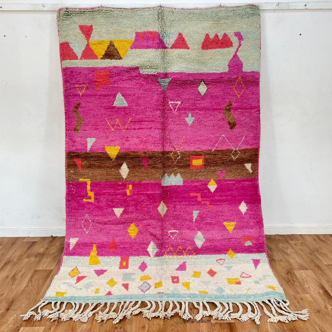 Vintage Moroccan wool rug with pink field and colorful Berber symbols, diamonds and triangles, handwoven in Morocco