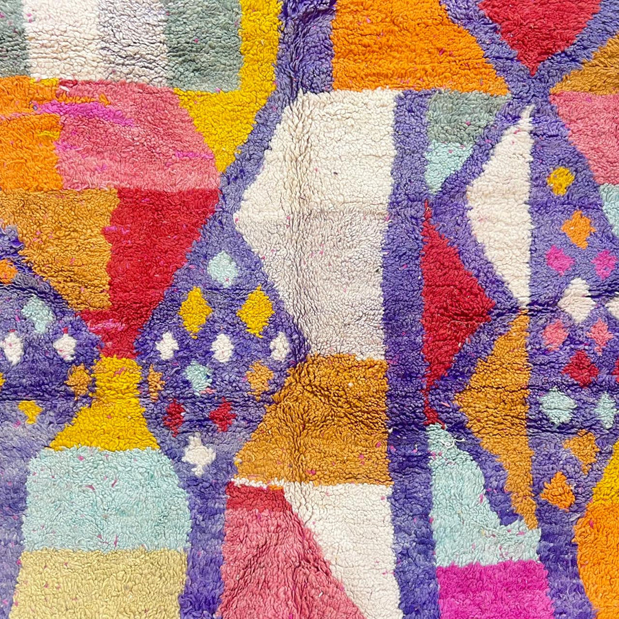 vintage moroccan berber rug with colorful geometric color-blocked pattern in wool