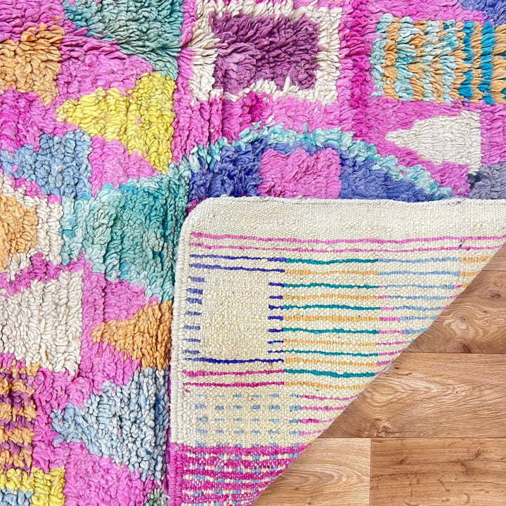 Vintage Moroccan wool rug 810 – colorful handmade Berber carpet with geometric diamond patterns in pink, mustard, green, and turquoise, 255 × 166 cm (8.36 × 5.44 ft).