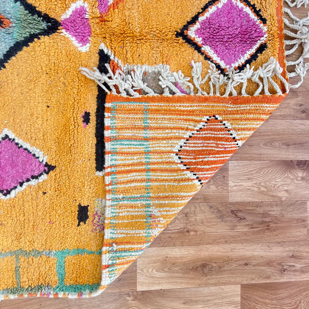 Vintage Moroccan Wool Rug 196 – handmade colorful orange, pink, and grey Berber wool rug (262 × 161 cm).