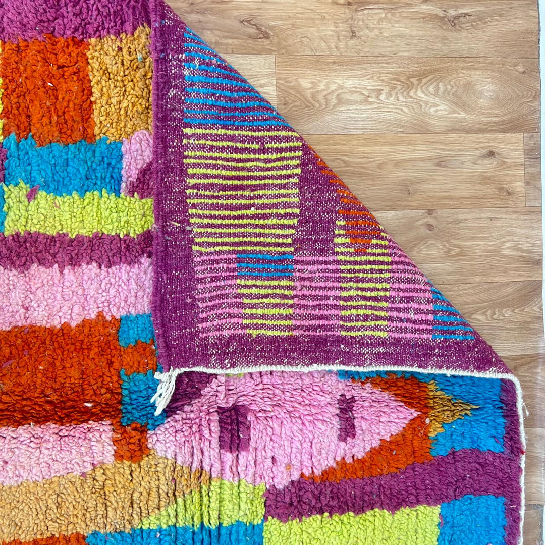Vintage Moroccan Wool Rug 188 – handmade colorful abstract Berber wool rug with magenta, yellow, and turquoise tones (243 × 148 cm).