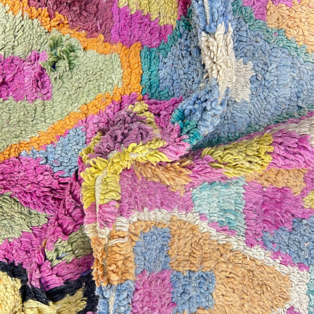 Vintage Moroccan wool rug 810 – colorful handmade Berber carpet with geometric diamond patterns in pink, mustard, green, and turquoise, 255 × 166 cm (8.36 × 5.44 ft).