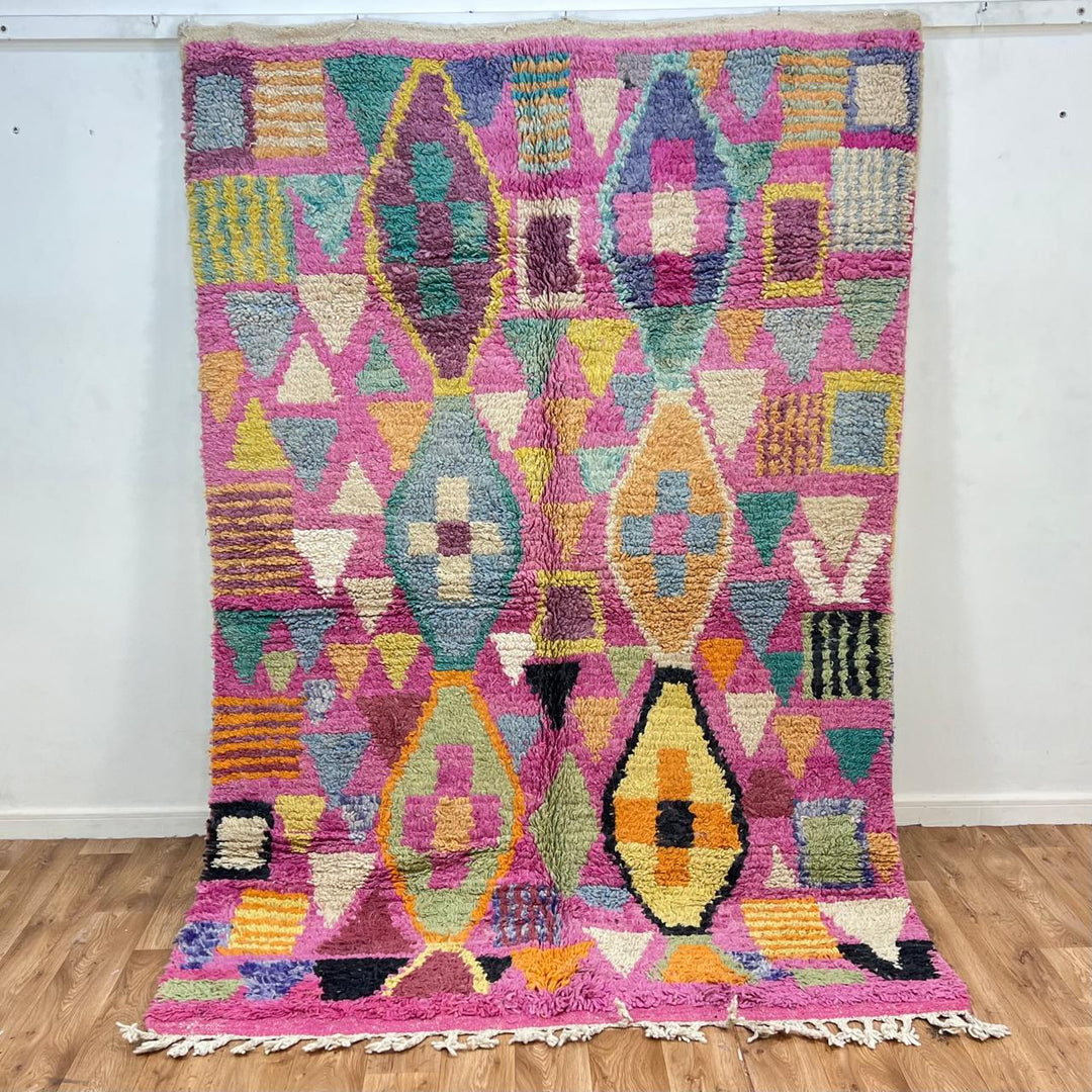 Vintage Moroccan wool rug 810 – colorful handmade Berber carpet with geometric diamond patterns in pink, mustard, green, and turquoise, 255 × 166 cm (8.36 × 5.44 ft).