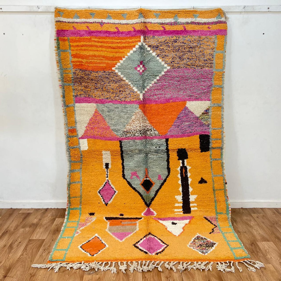 Vintage Moroccan Wool Rug 196 – handmade colorful orange, pink, and grey Berber wool rug (262 × 161 cm).