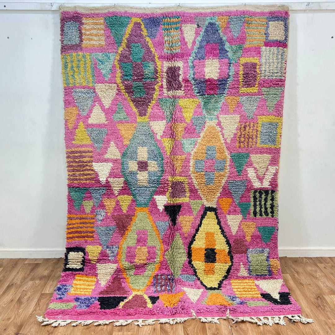 Vintage Moroccan wool rug 810 – colorful handmade Berber carpet with geometric diamond patterns in pink, mustard, green, and turquoise, 255 × 166 cm (8.36 × 5.44 ft).