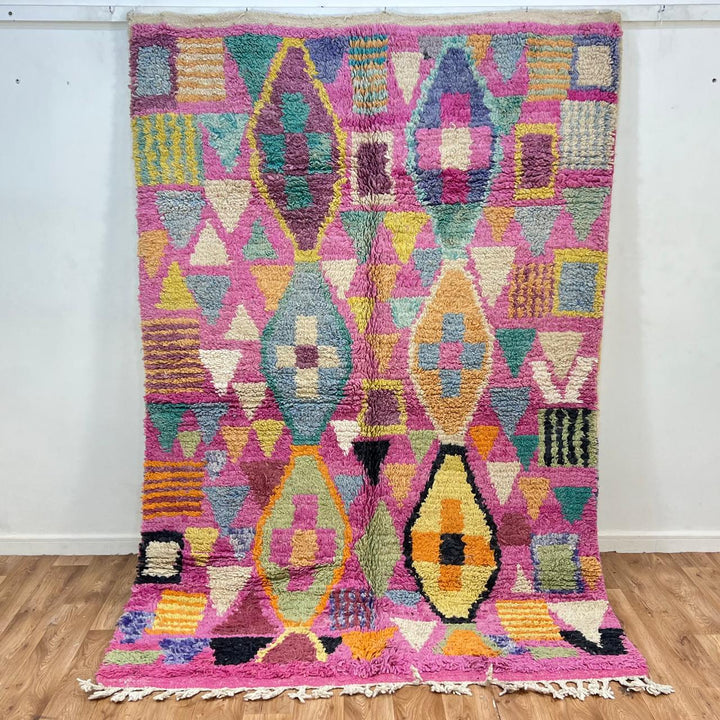 Vintage Moroccan wool rug 810 – colorful handmade Berber carpet with geometric diamond patterns in pink, mustard, green, and turquoise, 255 × 166 cm (8.36 × 5.44 ft).