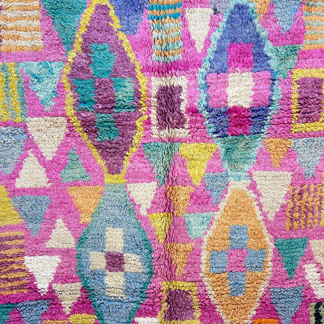 Vintage Moroccan wool rug 810 – colorful handmade Berber carpet with geometric diamond patterns in pink, mustard, green, and turquoise, 255 × 166 cm (8.36 × 5.44 ft).