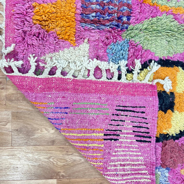Vintage Moroccan wool rug 810 – colorful handmade Berber carpet with geometric diamond patterns in pink, mustard, green, and turquoise, 255 × 166 cm (8.36 × 5.44 ft).