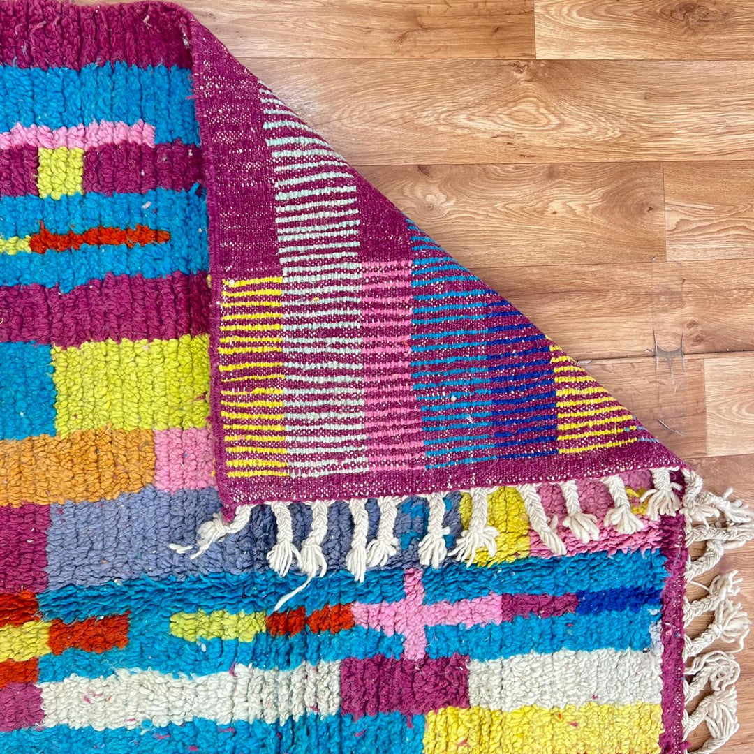 Vintage Moroccan Wool Rug 188 – handmade colorful abstract Berber wool rug with magenta, yellow, and turquoise tones (243 × 148 cm).