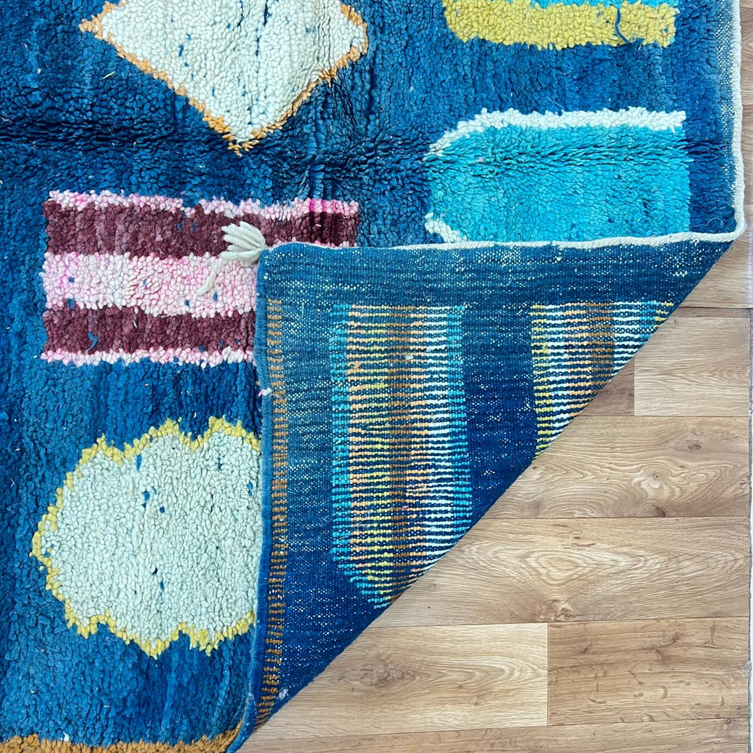 Vintage Moroccan wool rug 263 – handmade blue geometric Berber design with mustard and ivory accents (253 × 157 cm).