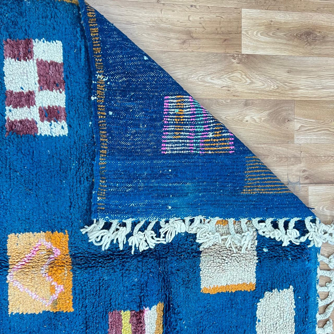 Vintage Moroccan wool rug 263 – handmade blue geometric Berber design with mustard and ivory accents (253 × 157 cm).