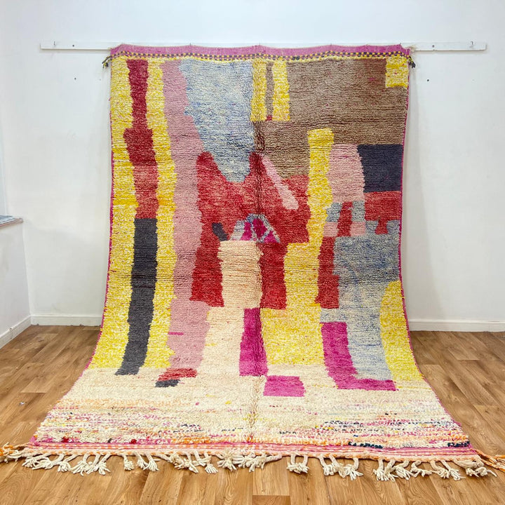 Vintage Moroccan wool rug 916 – handmade Berber rug with colorful abstract design in yellow, pink, and red tones (314 × 200 cm).
