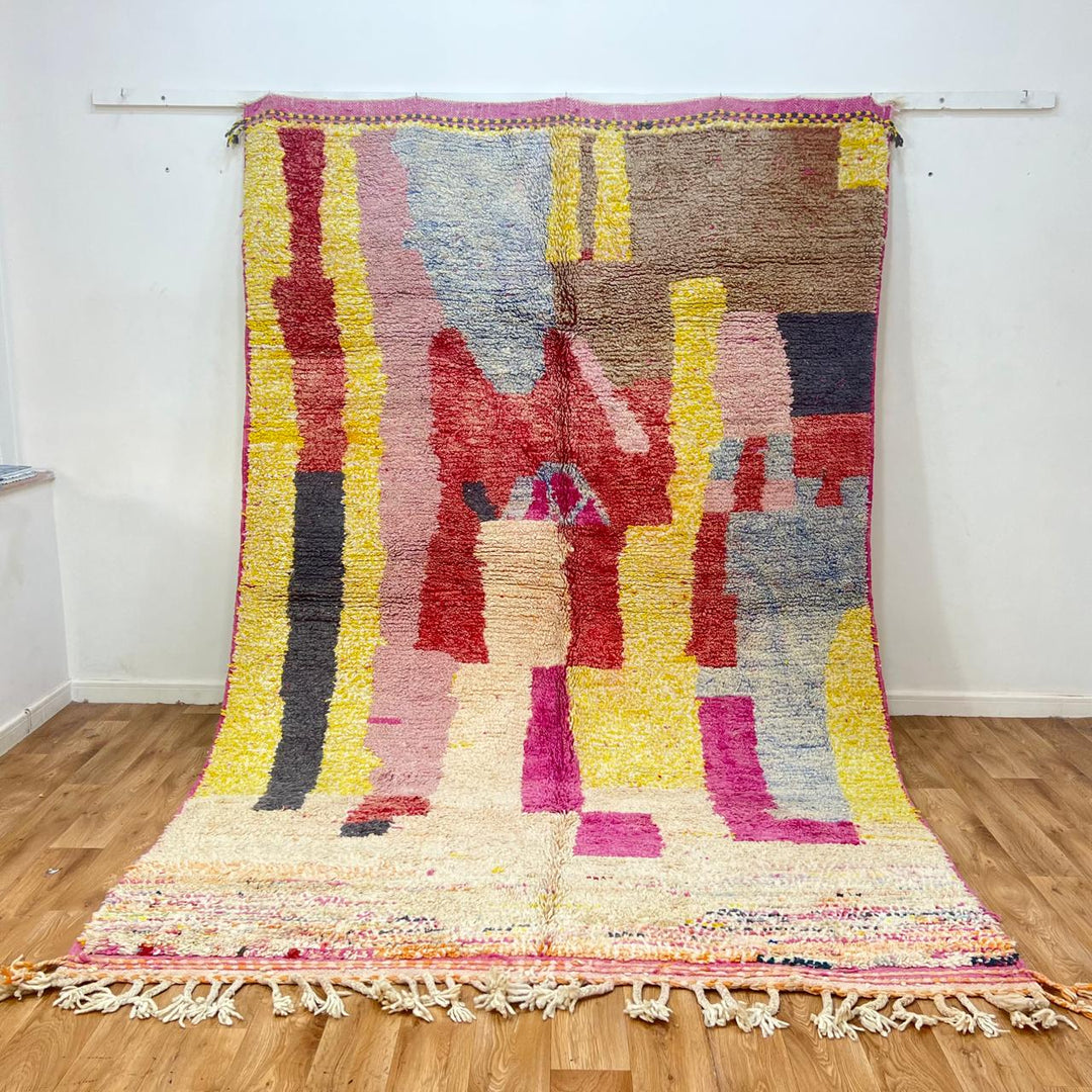 Vintage Moroccan wool rug 916 – handmade Berber rug with colorful abstract design in yellow, pink, and red tones (314 × 200 cm).
