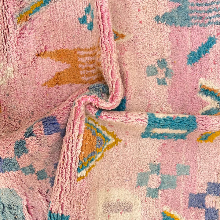 Vintage Moroccan wool rug 202 – handmade Berber rug with pastel pink, yellow, and blue geometric patterns (236 × 160 cm).