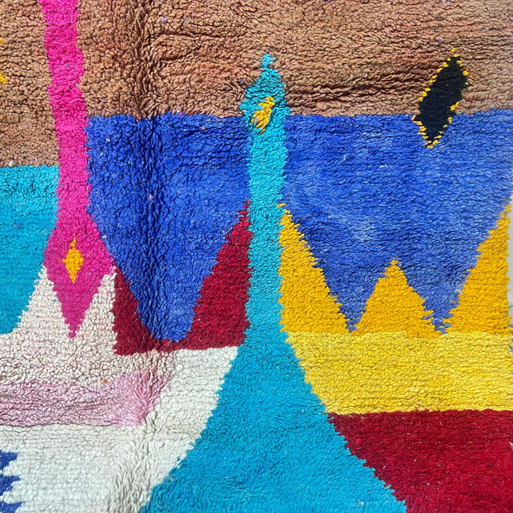 Vintage Moroccan wool rug 252 – handmade Berber carpet with colorful abstract design in blue, yellow and pink tones (259 × 157 cm).
