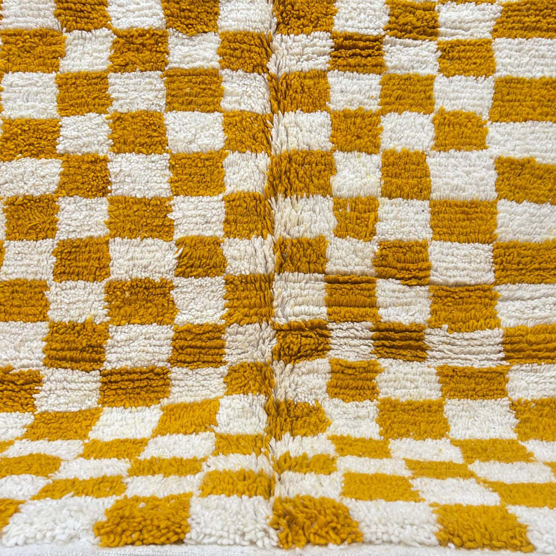 Vintage Moroccan Wool Rug 133 – handmade mustard and cream checkerboard Moroccan wool rug (240 × 172 cm).