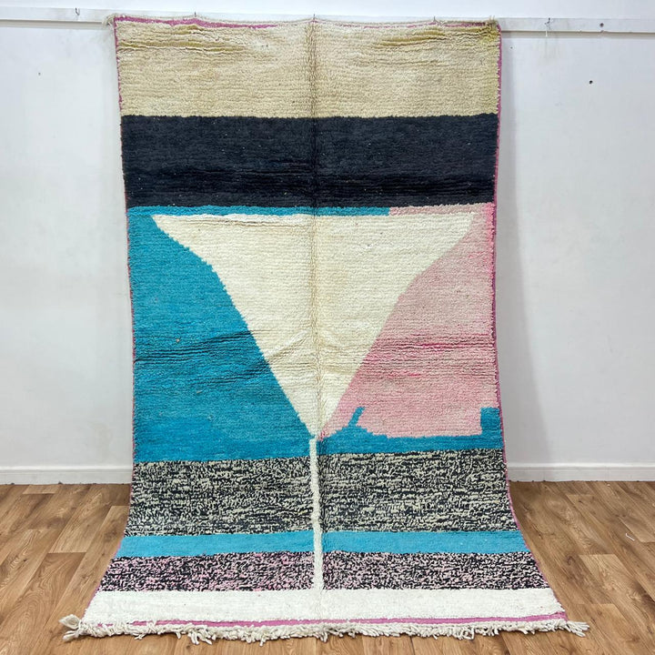 Vintage Moroccan wool rug 204 – handmade blue, cream, and pink geometric abstract Berber design (268 × 156 cm).