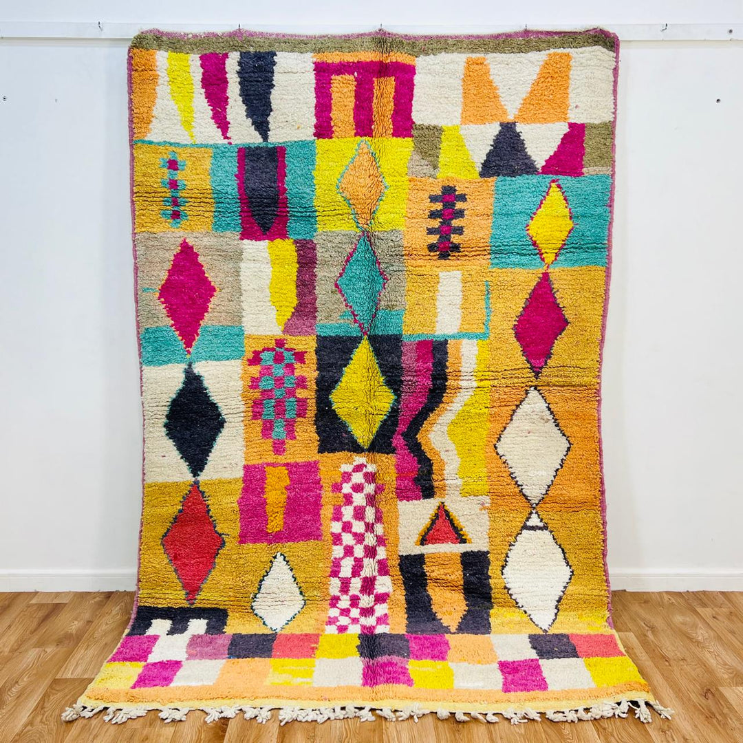 Vintage Moroccan wool rug with colorful Berber geometric grid pattern in yellow, pink, turquoise and ivory, handmade in Morocco, 251x164 cm