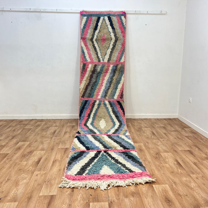 Vintage Moroccan wool runner rug 816 – handmade Berber carpet with colorful diamond geometric pattern in cream, pink, teal, and navy, 378 × 85 cm (12.40 × 2.78 ft).