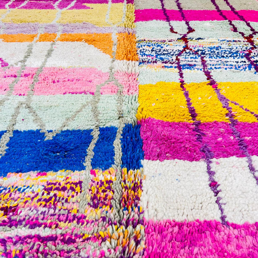 Vintage Moroccan Berber wool rug with colorful geometric patchwork pattern