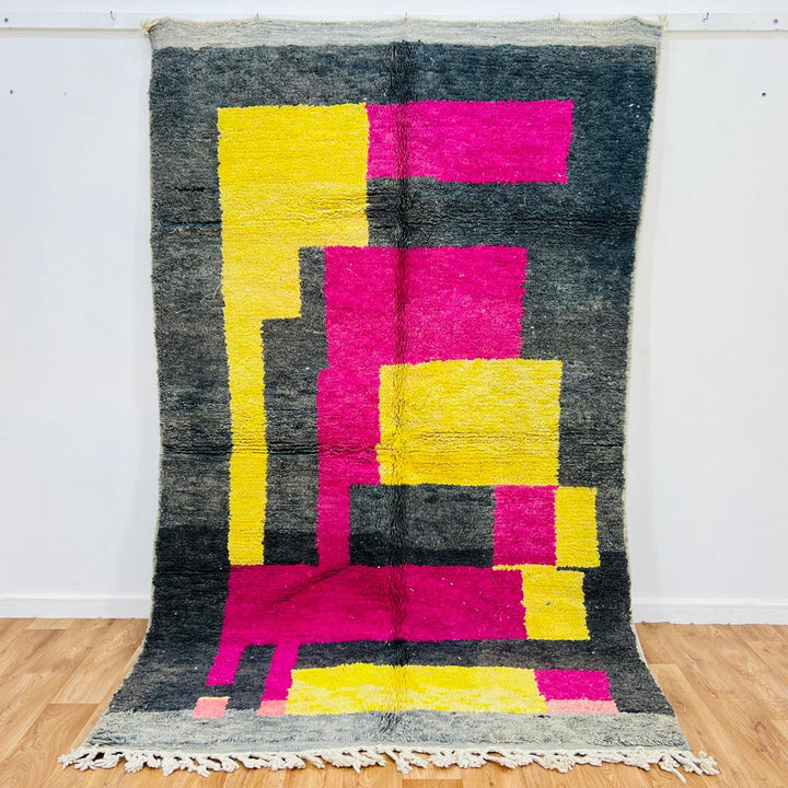 Vintage Moroccan wool rug with pink yellow and charcoal geometric pattern, handwoven Berber carpet from Morocco