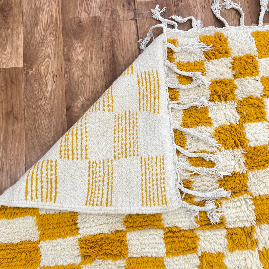 Vintage Moroccan Wool Rug 133 – handmade mustard and cream checkerboard Moroccan wool rug (240 × 172 cm).