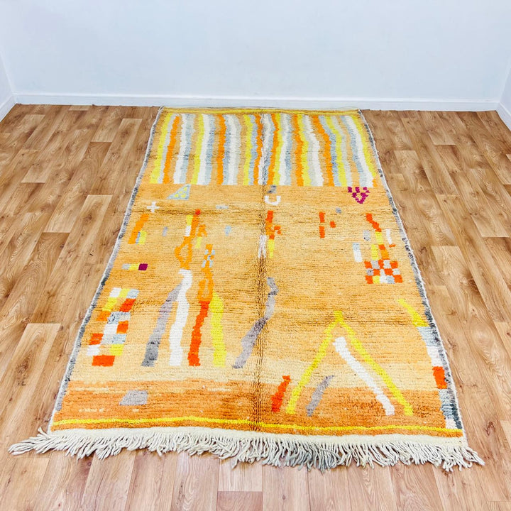 Vintage Moroccan wool rug with beige, orange and yellow abstract Berber pattern