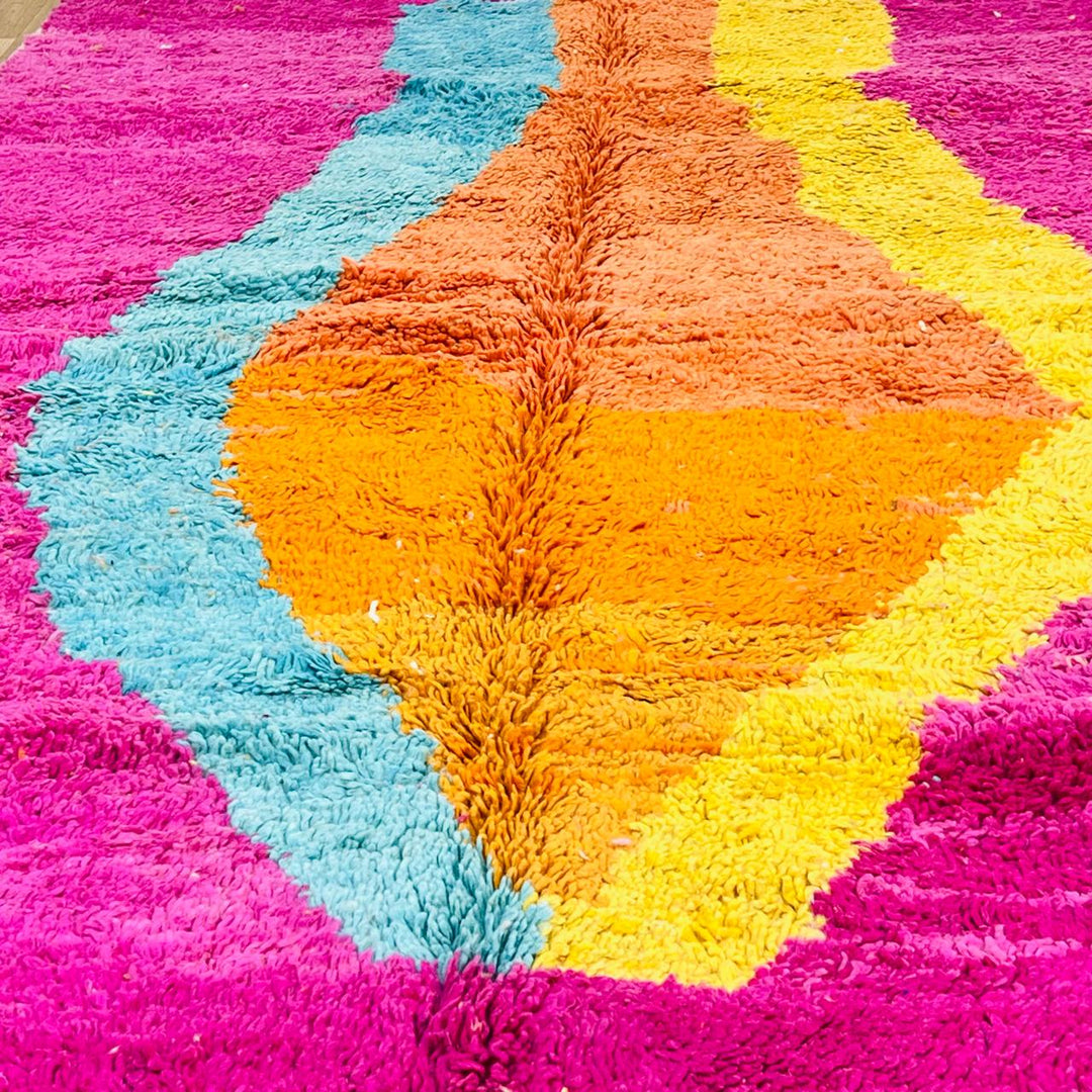 Vintage Moroccan wool rug with pink base, turquoise, orange and yellow abstract Berber design, handmade in Morocco, size 255x156 cm