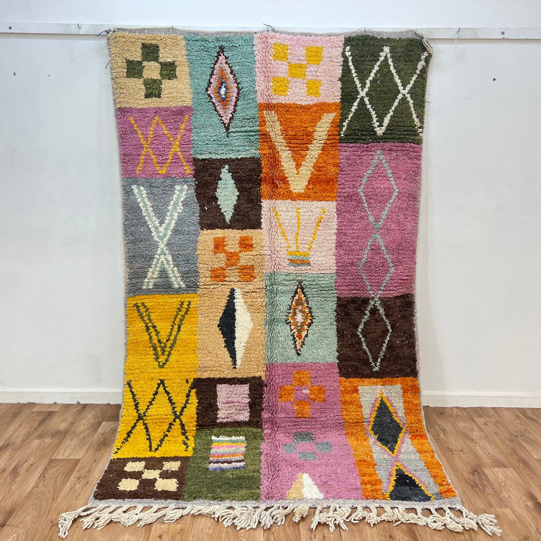 Vintage Moroccan wool rug 250 – handwoven Berber patchwork design in pink, yellow and green tones (254 × 155 cm).