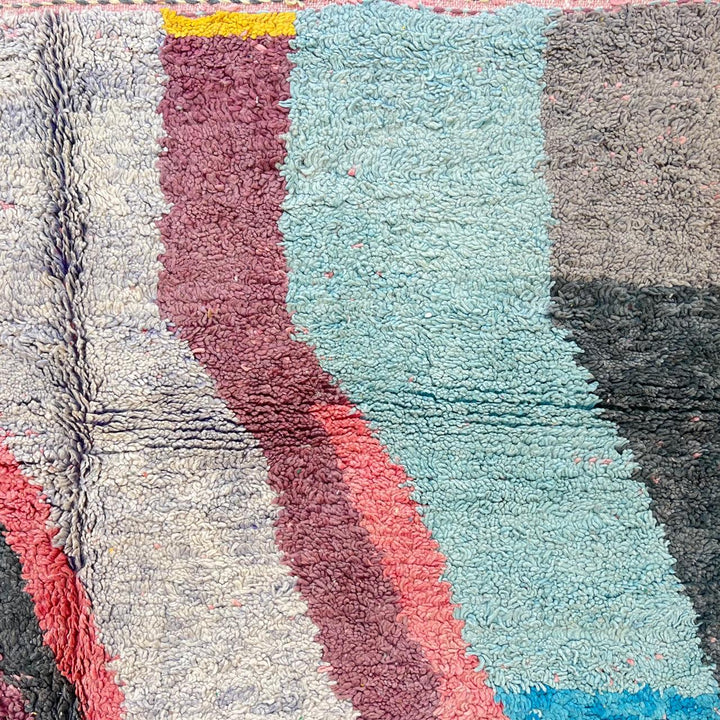 Vintage Moroccan wool rug 875 – handmade colorful Berber carpet with geometric shapes in pink, yellow, and turquoise (300 × 198 cm / 9.84 × 6.5 ft).