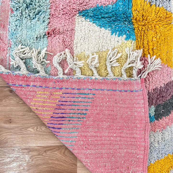 Vintage Moroccan wool rug 875 – handmade colorful Berber carpet with geometric shapes in pink, yellow, and turquoise (300 × 198 cm / 9.84 × 6.5 ft).