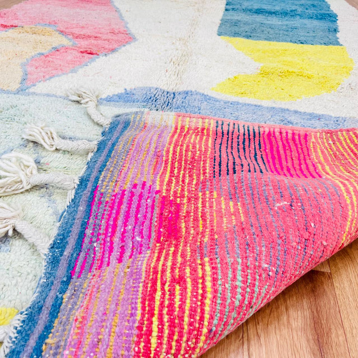 Vintage Moroccan wool rug with abstract color block design in ivory, pink, blue, yellow and charcoal, handmade Berber rug from Morocco