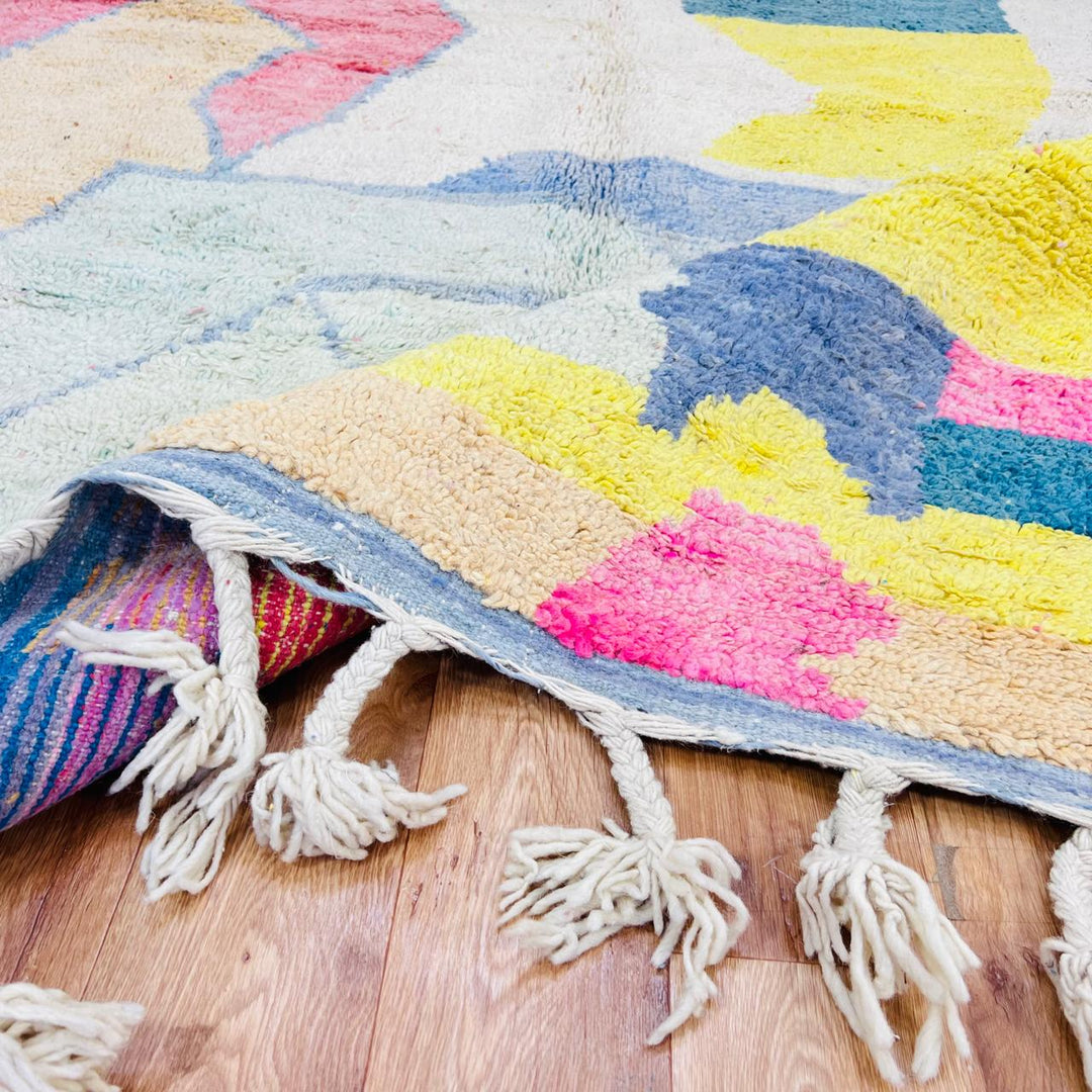 Vintage Moroccan wool rug with abstract color block design in ivory, pink, blue, yellow and charcoal, handmade Berber rug from Morocco