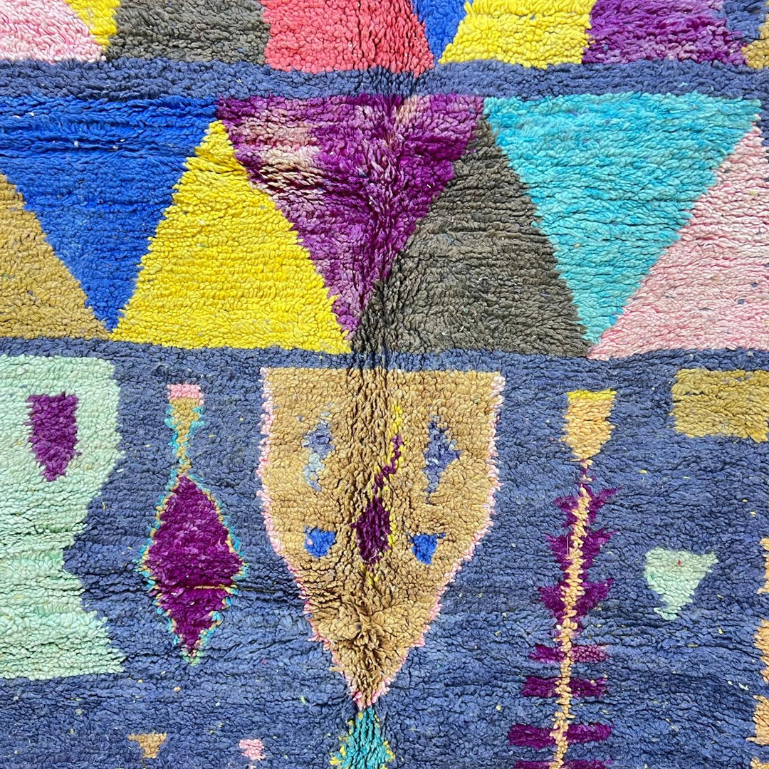Vintage Moroccan wool rug 158 – handmade geometric colorful pattern in blue, purple, and mustard tones (264 × 147 cm).