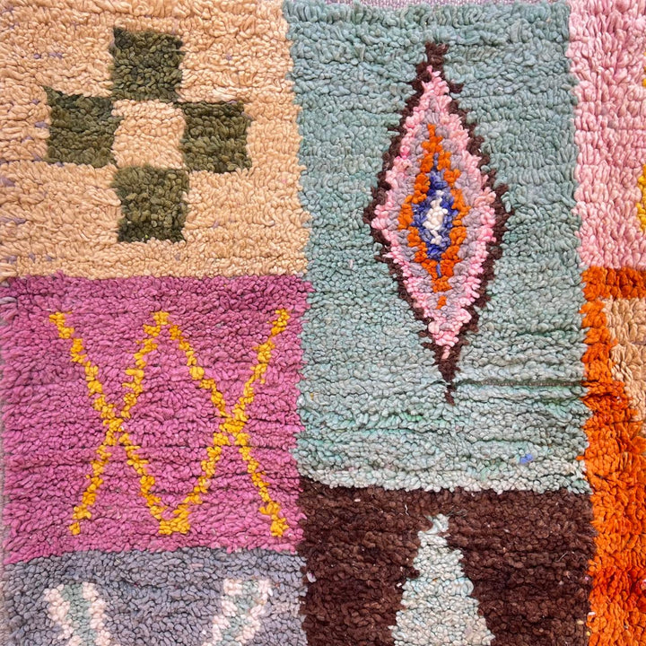 Vintage Moroccan wool rug 250 – handwoven Berber patchwork design in pink, yellow and green tones (254 × 155 cm).