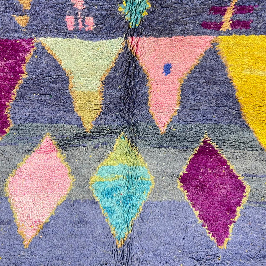 Vintage Moroccan wool rug 158 – handmade geometric colorful pattern in blue, purple, and mustard tones (264 × 147 cm).