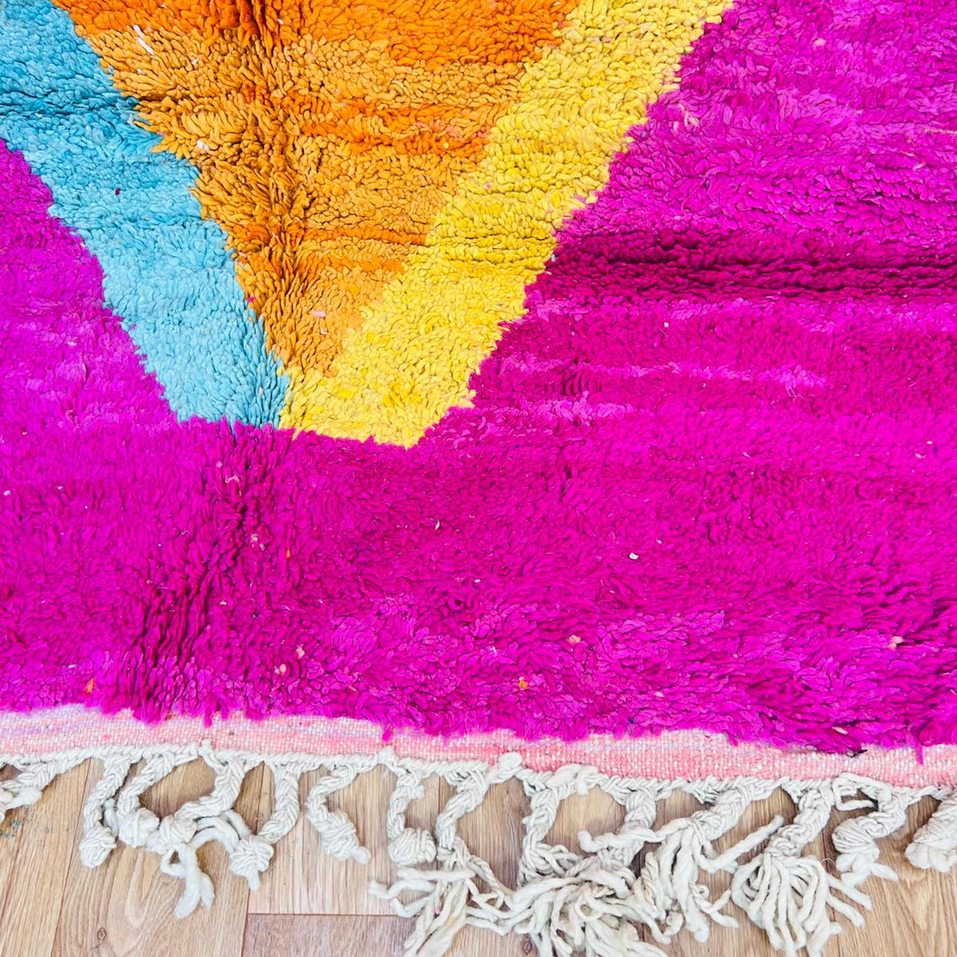 Vintage Moroccan wool rug with pink base, turquoise, orange and yellow abstract Berber design, handmade in Morocco, size 255x156 cm