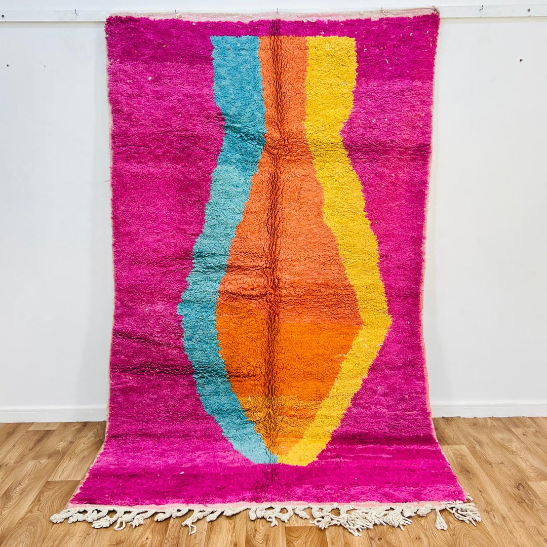 Vintage Moroccan wool rug with pink base, turquoise, orange and yellow abstract Berber design, handmade in Morocco, size 255x156 cm