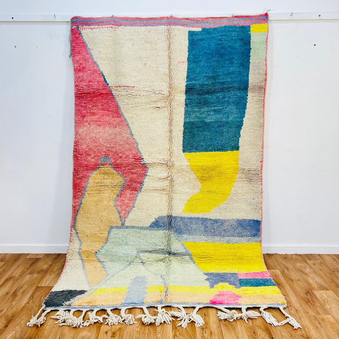 Vintage Moroccan wool rug with abstract color block design in ivory, pink, blue, yellow and charcoal, handmade Berber rug from Morocco